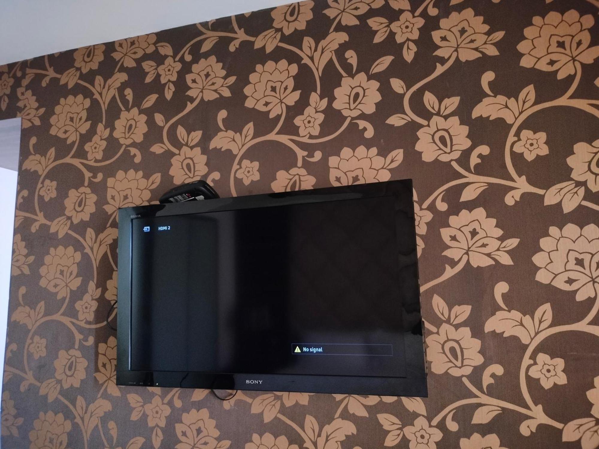 Holiday Inn Chandigarh Panchkula, An Ihg Hotel Kültér fotó A television mounted on a wall